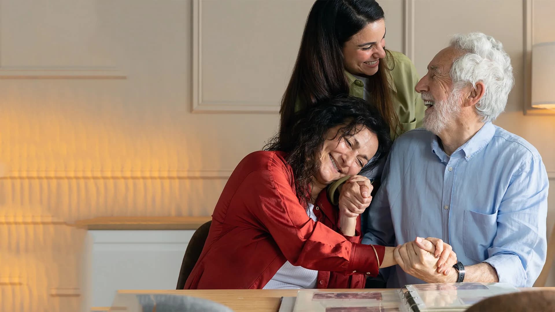 A family sharing a supportive moment, representing personal growth and stronger relationships.